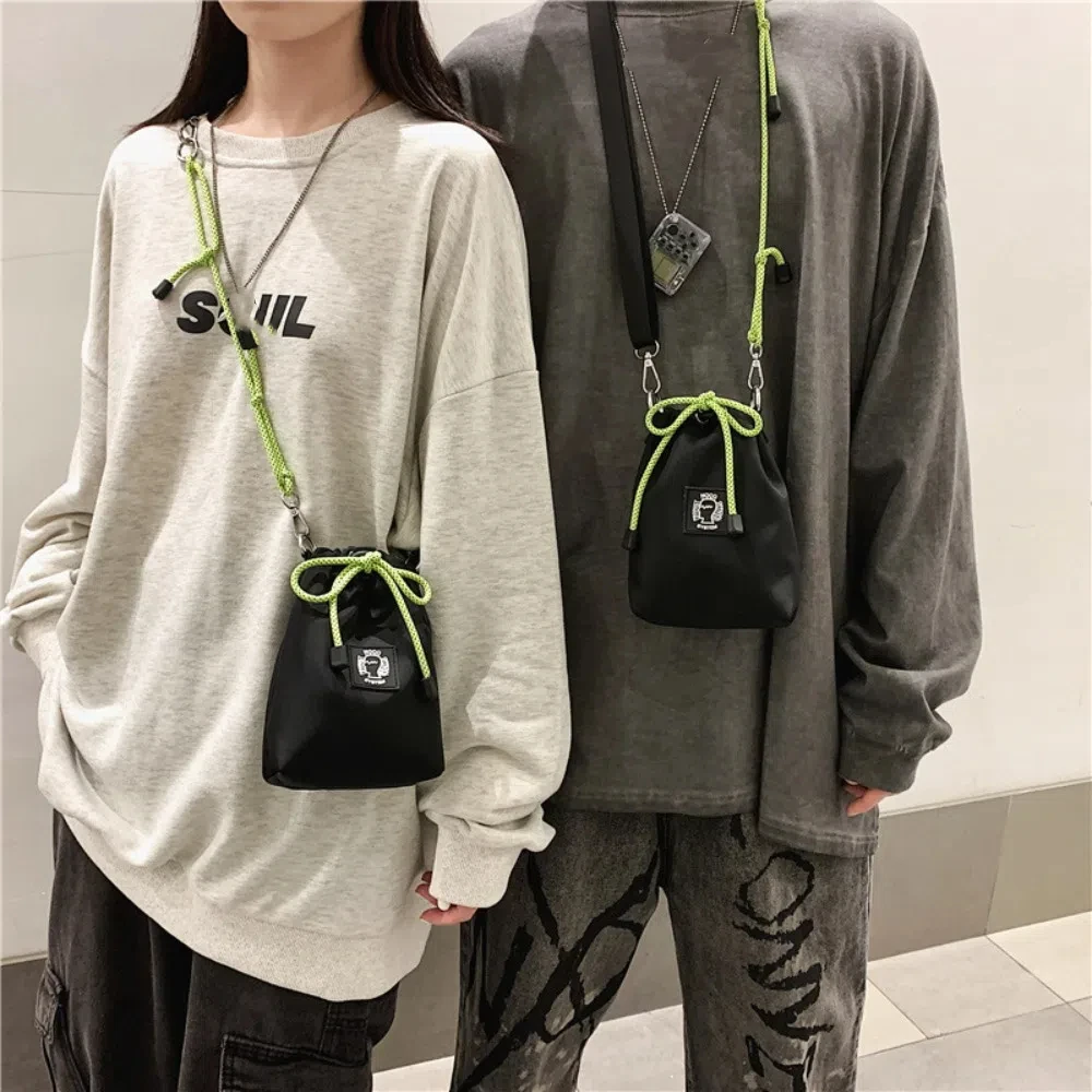 

Casual Drawstring Bucket Bag Nylon Large Capacity Male Crossbody Bag Single Shoulder Fluorescent Color Strap Mobile Phone Bag