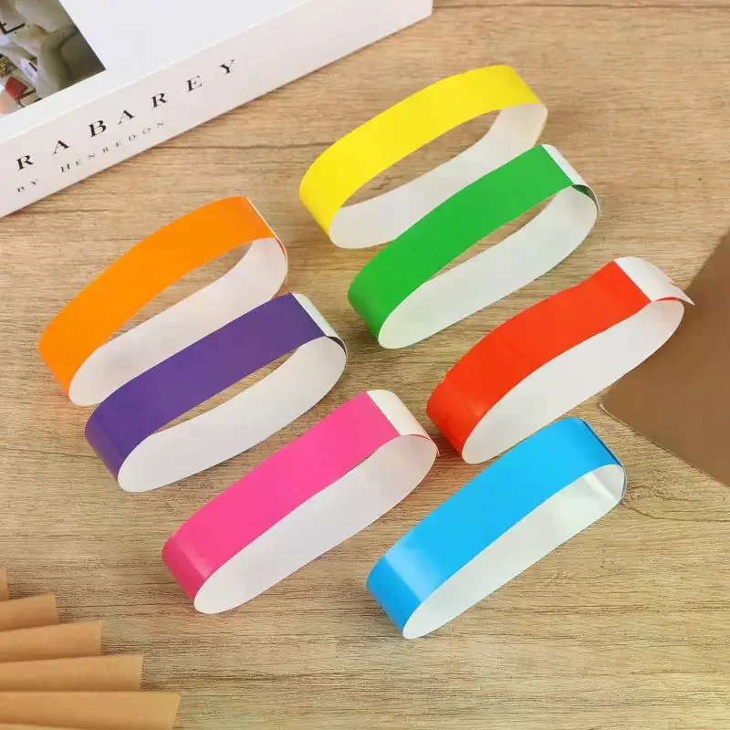 100Pcs Plastic Adhesive Wristbands Synthetic Paper Sticky Bands for Birthday Festival Crowd Control