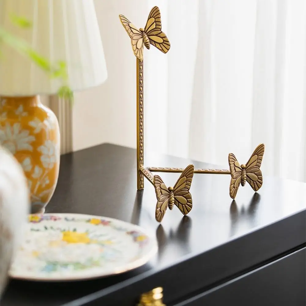 

Винтажный дизайн, подставка для тарелок из сплава в виде бабочки, обеденный стол с мотивом бабочки, золотой декоративный мольберт, светильник, роскошный стиль, латунь