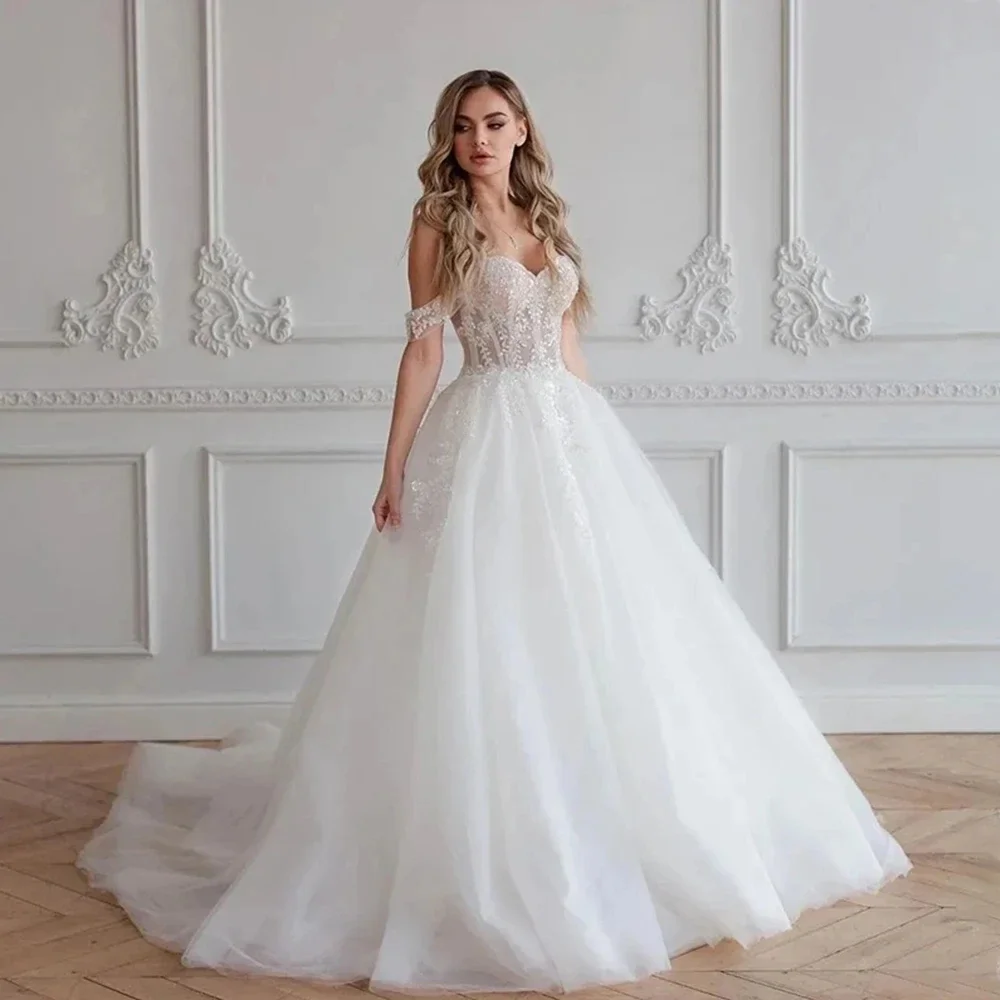 

CustomizdGlamorous Свадебные платья Милые свадебные платья Кружевные аппликации Трапеции с открытыми плечами Vestido De Noival