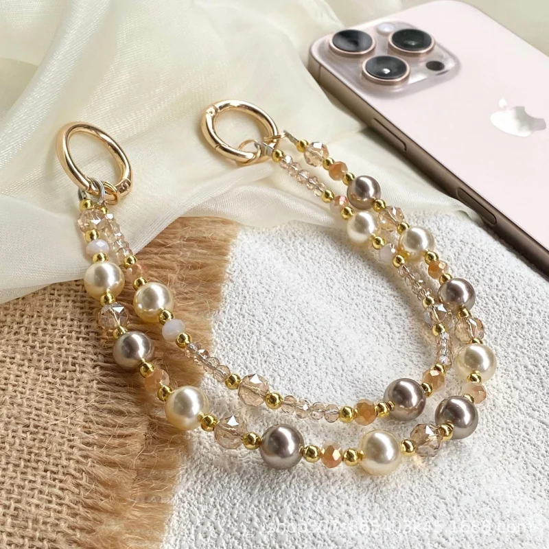 

Amber gold foil bead crystal double-chain phone strap, high-end anti-loss pendant, luxurious style keychain phone lanyard