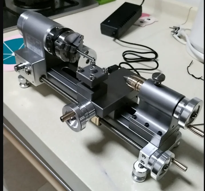 DIY Mini Lathe 100-2500RPM, Multifunctional Woodworking Lathe 110V-220V Desktop Micro-Lathe for Home Use