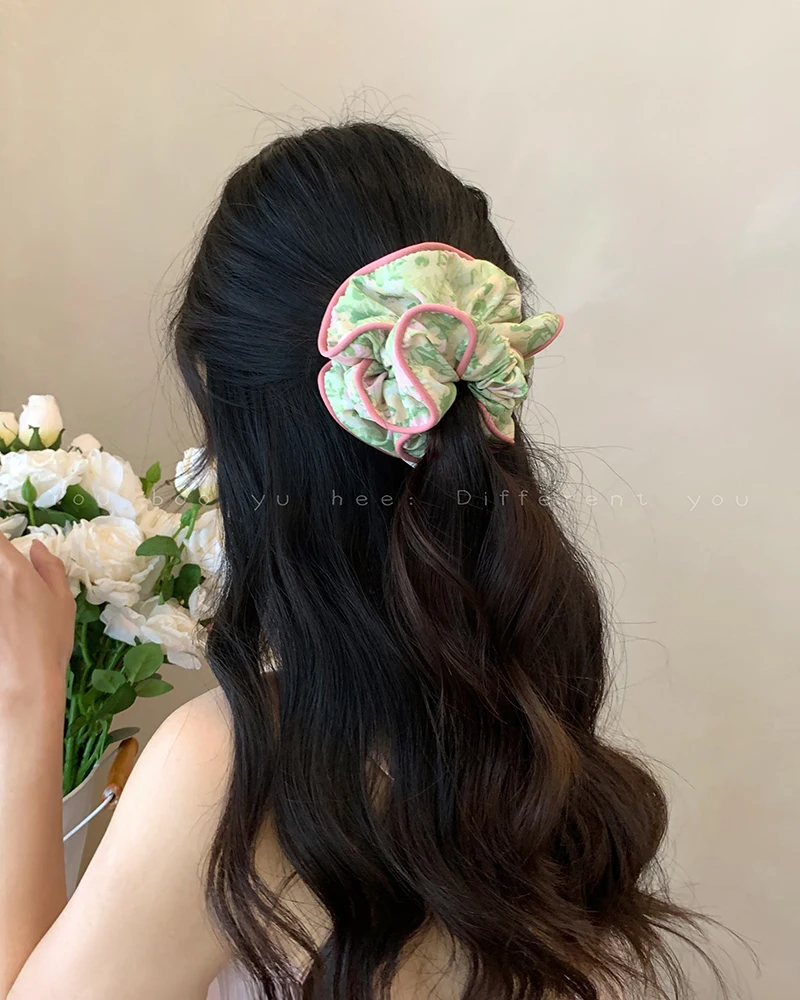 Korean Floral Scrunchie for Women - Chic and Playful Design, Adds a Luxurious Touch to Your Look.