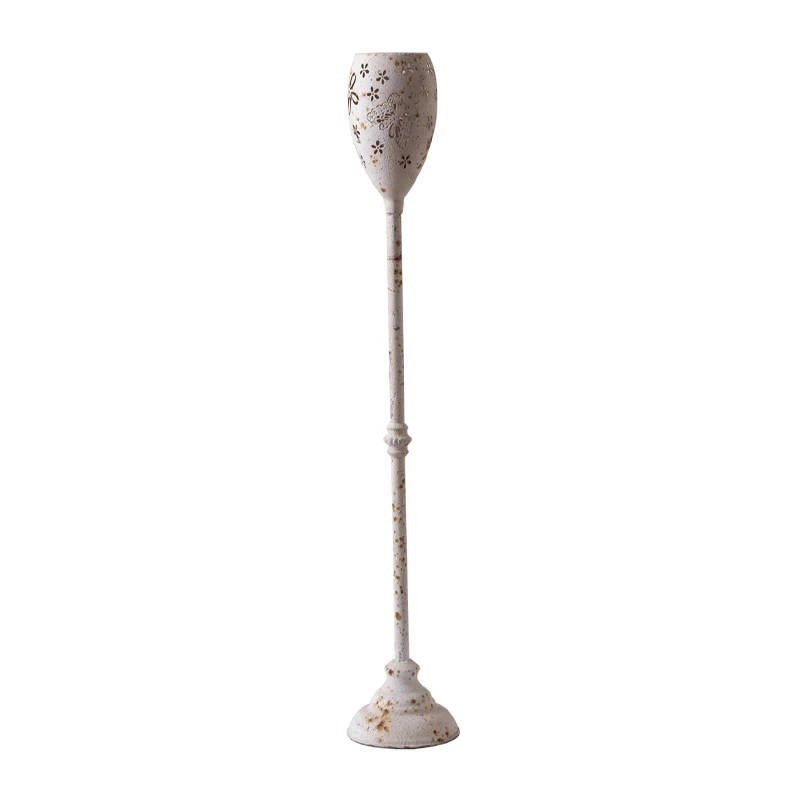 

Retro carved hollow wrought iron floor ornament soft decoration design atmosphere decoration candlestick holder