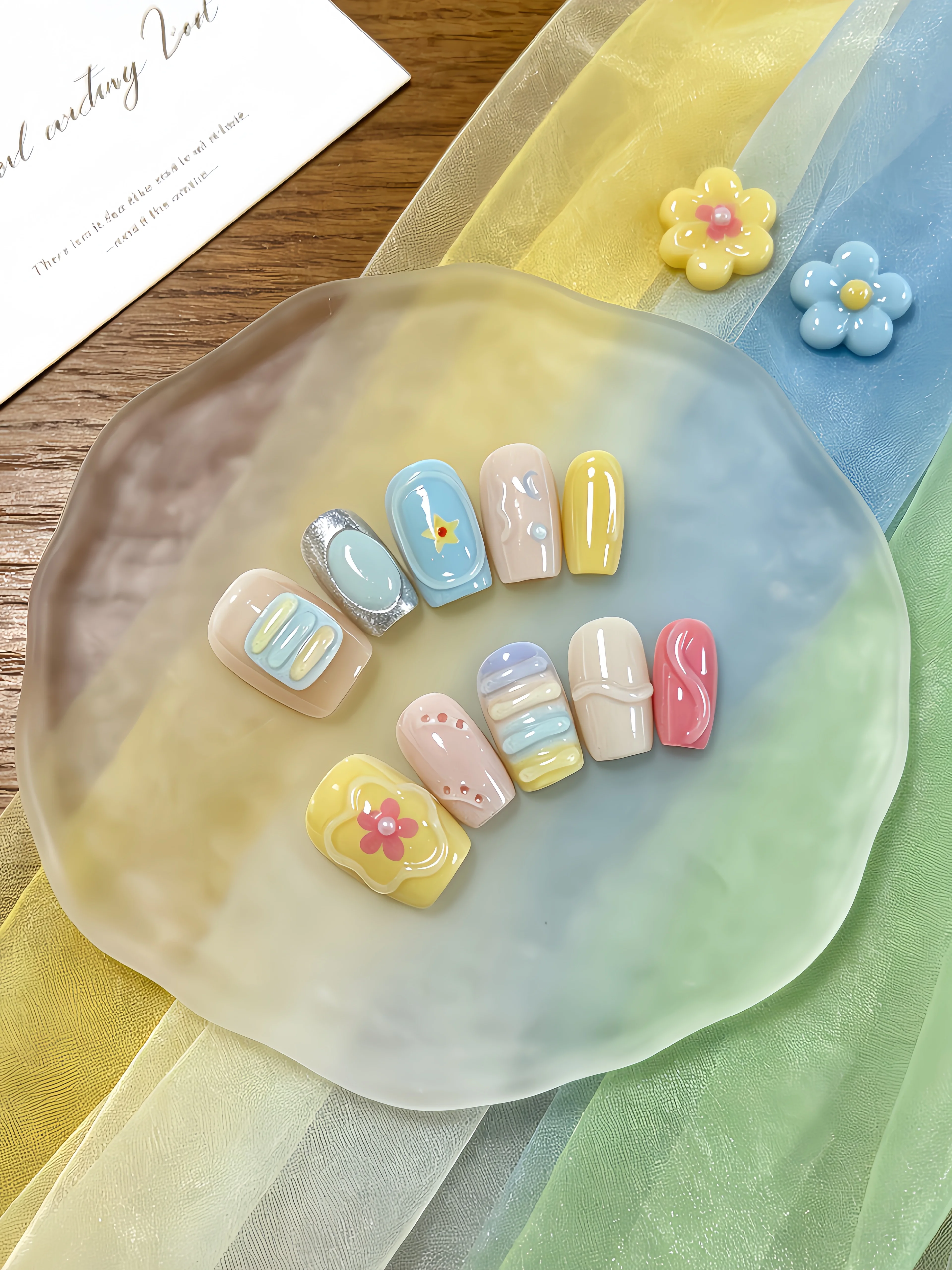 10 Short Square-Shaped Nail Tips with a Light Blue, Soft Yellow, Nude Pink, and Rose Red Multi-Color Gradient as the Main Colors, in a Fresh and Trendy Ins-Style Nail Design, Featuring Floral, Star, Polka Dot, Moon, and Multi-Color Gradient Stripe Designs, a Gentle French-Style Nail Art, Suitable for Office Workers, Students, Sweet Girls' Daily Life, College, Dates, Picnics, Summer Vacation Season, Etc. Press-On Fake Nails, Includes a Jelly Glue and a Nail File