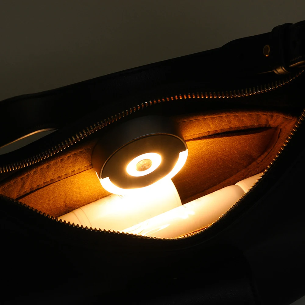 Luce per borsa con sensore automatico Illumina la luce rotonda della borsa con clip posteriore Luci per borsa con controllo touch per accessori per borse