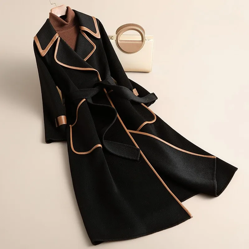 

Новое элегантное шерстяное пальто большого размера, свободного кроя, с длинными завязками и двусторонней отделкой.