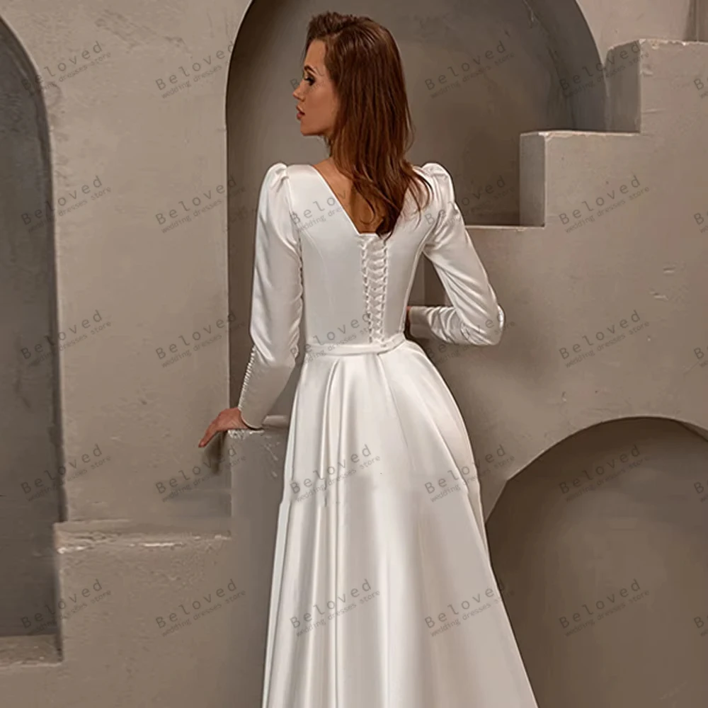 ชุดแต่งงานผ้าซาตินเรียบง่ายทรงเอไลน์ แขนยาว คอเหลี่ยม ดีไซน์สวยงาม  รับตัดตามสั่ง ปี 2026