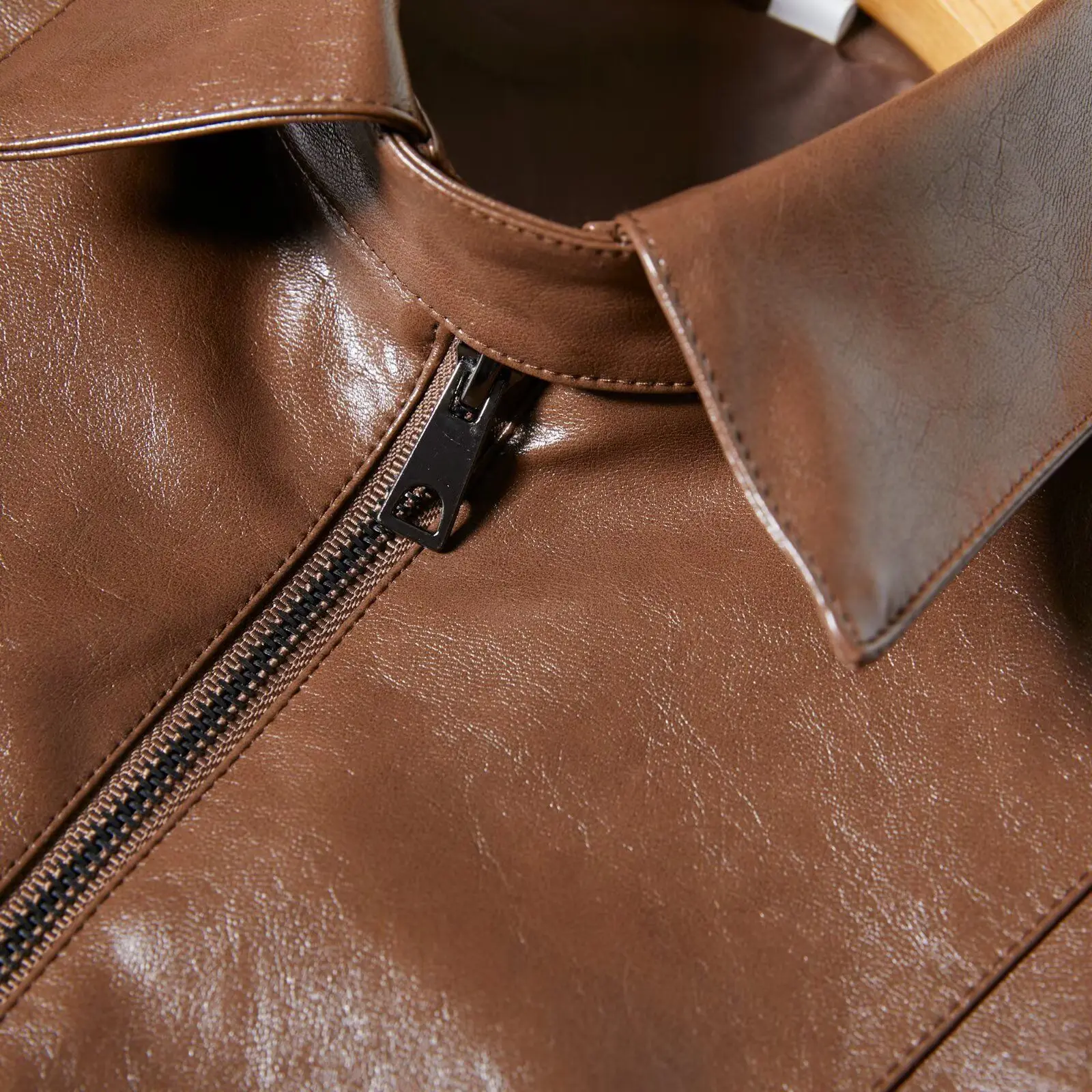 Jaqueta de couro pu da moda feminina manga fenda gola stand up casaco estilo europeu e americano comércio