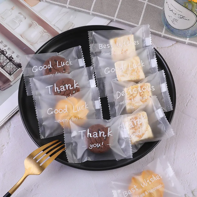 

100Pcs English Printed 4 in 1 Frosted Self-adhesive Self Sealing DIY Biscuit Cookie Snowflake Pastry Packaging Bags