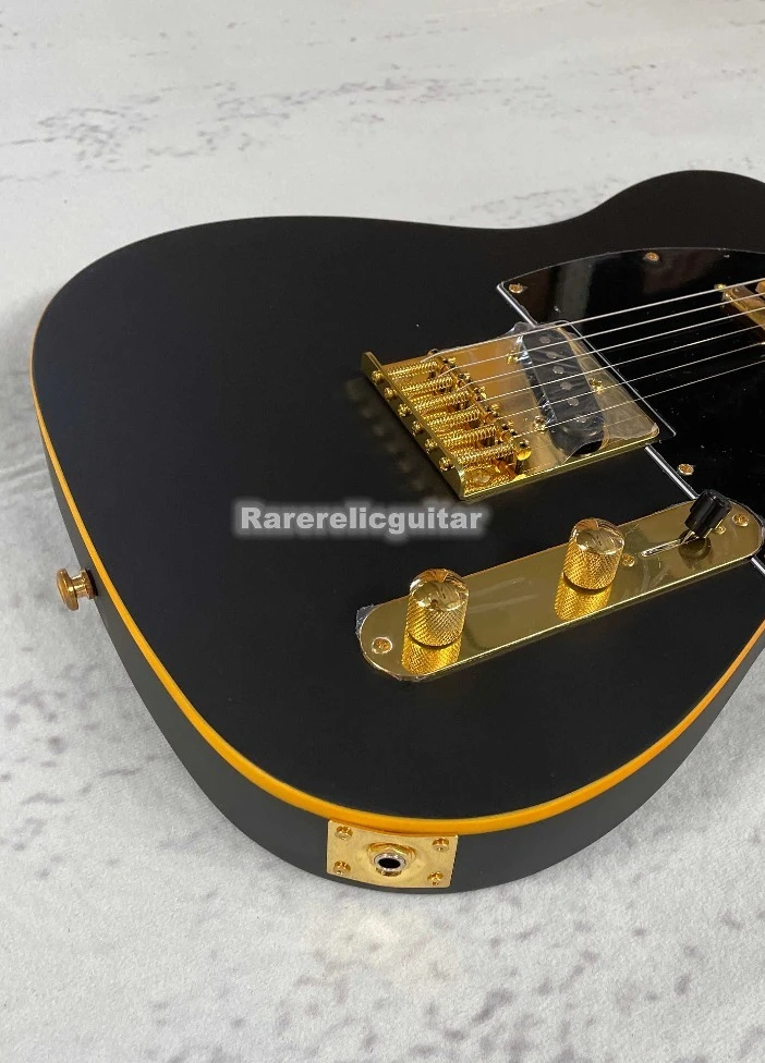 Guitarra eléctrica TL negra mate con ribete amarillo, diapasón de arce, incrustaciones de puntos negros, puente tremolo, herrajes dorados