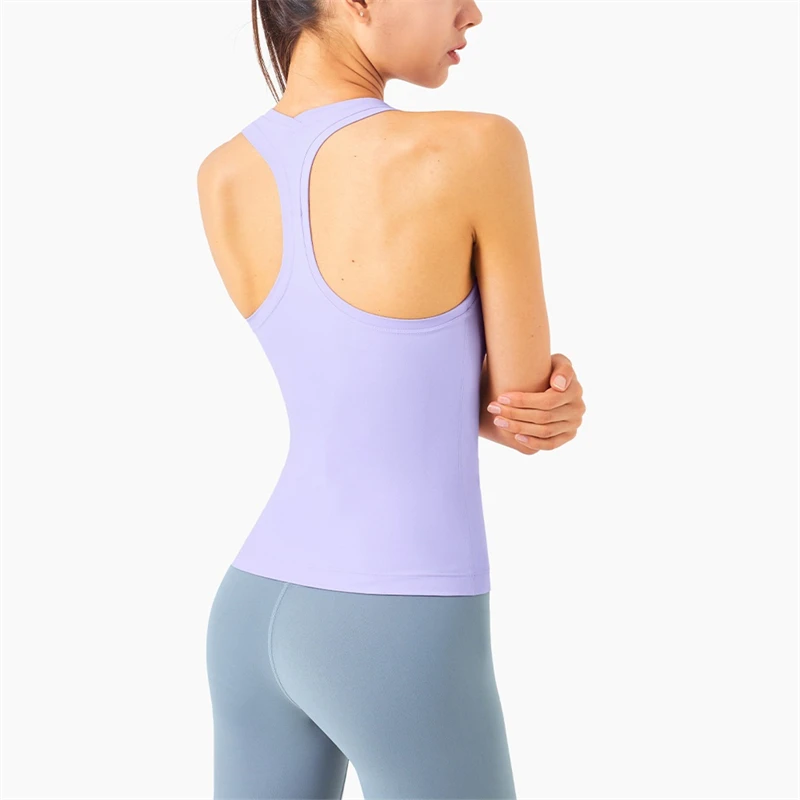 Canotta sportiva in tinta unita canotta sportiva da donna senza maniche canotta da Yoga a forma di Y t-shirt attillata morbida per il Fitness