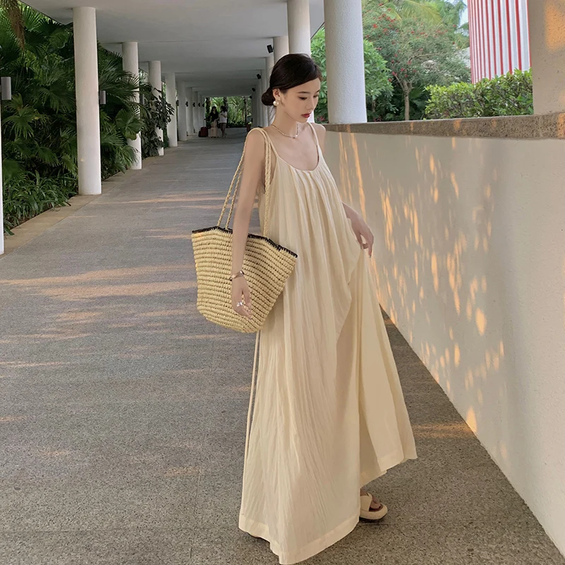 فستان طويل بدون ظهر للنساء لقضاء العطلات على الشاطئ، تصميم فضفاض، تنورة صيفية على شكل حرف A، ياقة مستديرة بدون أكمام