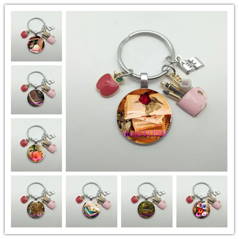 

Retro books glass keychain convex pendant library bookcase keychain, enamel pink pen holder students and teachers hanging gifts.