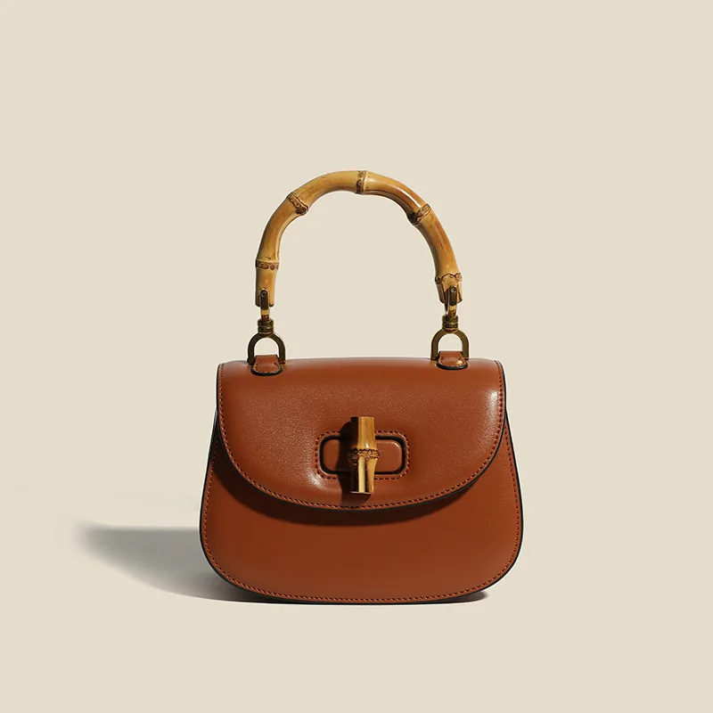 

2025 Niche Design Cowhide High-end Single-shoulder Crossbody Bag Fashion Women Handbag Genuine Leather Bamboo Handle Saddle Bags