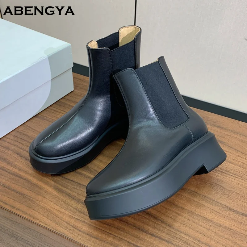 

Лидер продаж, черные кожаные ботинки до середины икры, женские повседневные короткие ботинки с круглым носком на плоской платформе, зимние дизайнерские вечерние ботинки челси, женские ботинки