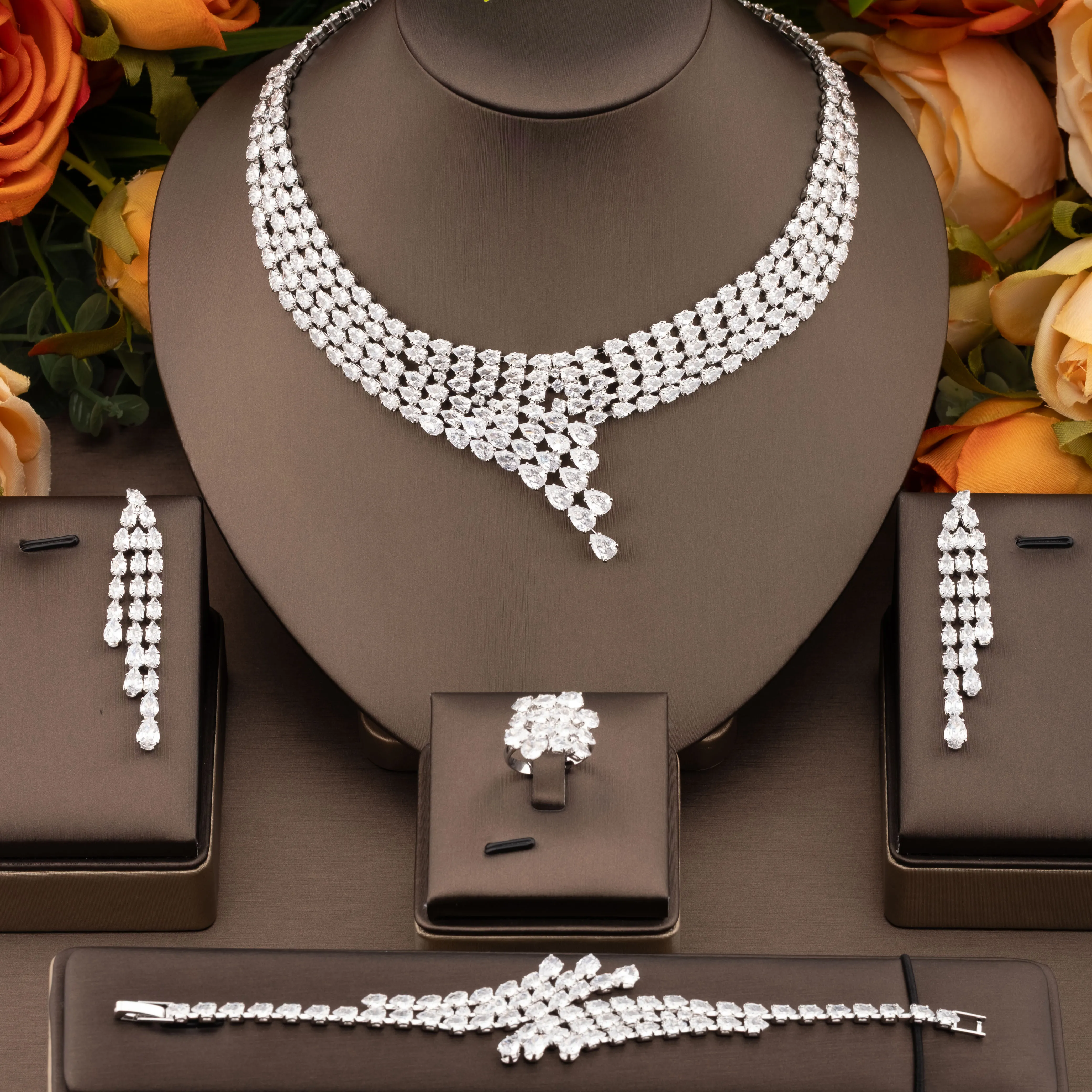 1 set of luxurious and elegant jewelry set with sparkling cubic zirconia and interlaced design, suitable for women to wear at weddings and banquets. Gift box not included