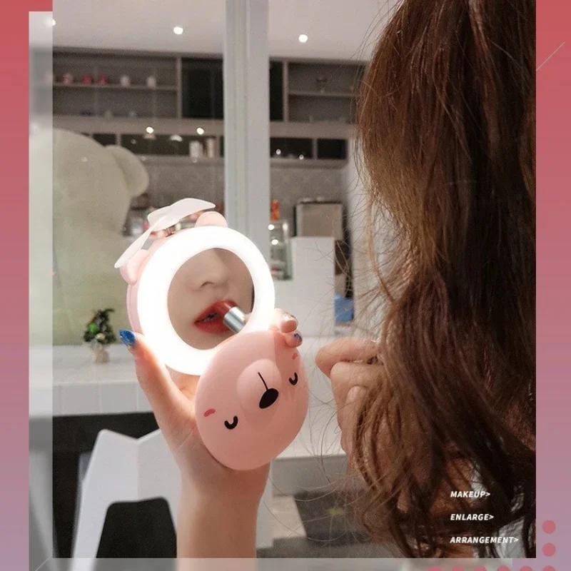 2024 Summer New Mini Handheld Fan Multi Functional Cartoon Piggy Makeup Mirror Fill Light Cool Portable Fan Pocket Mirror Fan