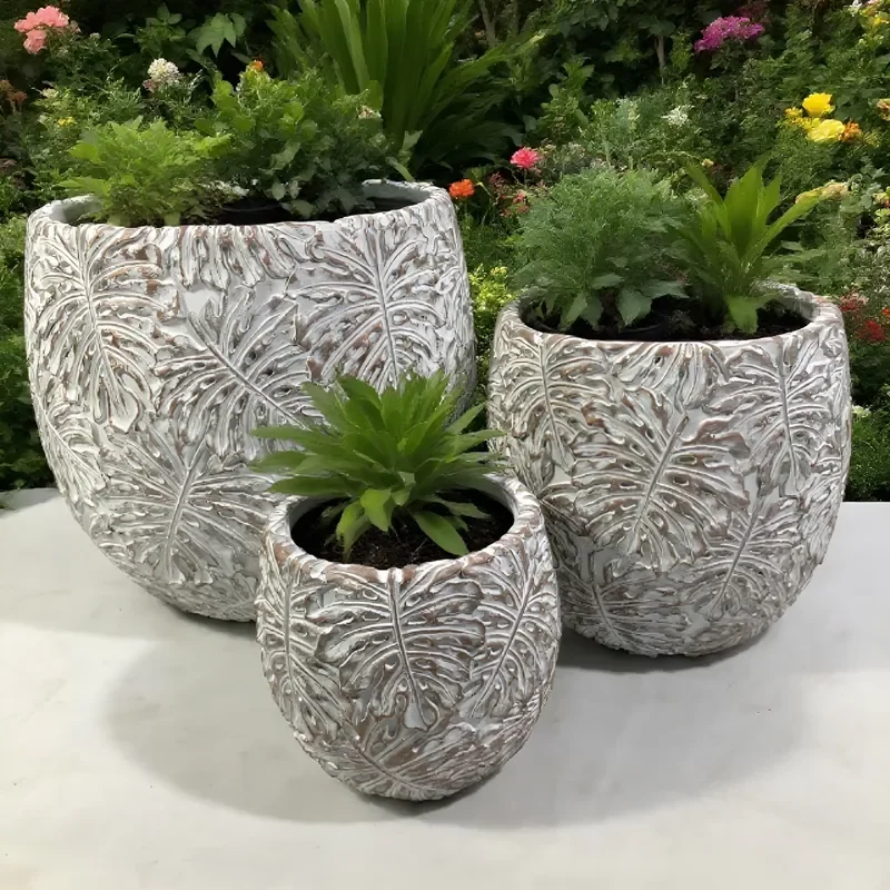 for Europe Style Durable Eco-Friendly Round Cement Outdoor Planter with Powder Coated Drainage Holes 50-100L Green Palm Leaf