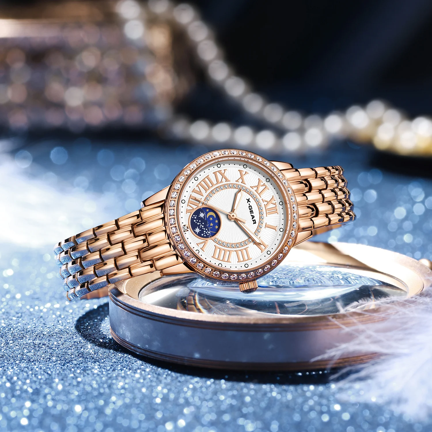 ساعة أنيقة من الذهب الوردي الماسي للنساء مقاومة للماء من الفولاذ المقاوم للصدأ بحركة ميكانيكية للسيدات بمينا نجمة القمر والشمس