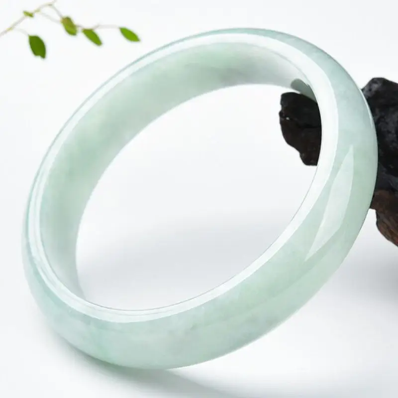 Ice-waxy bracelet, light oil green jadeite bangle