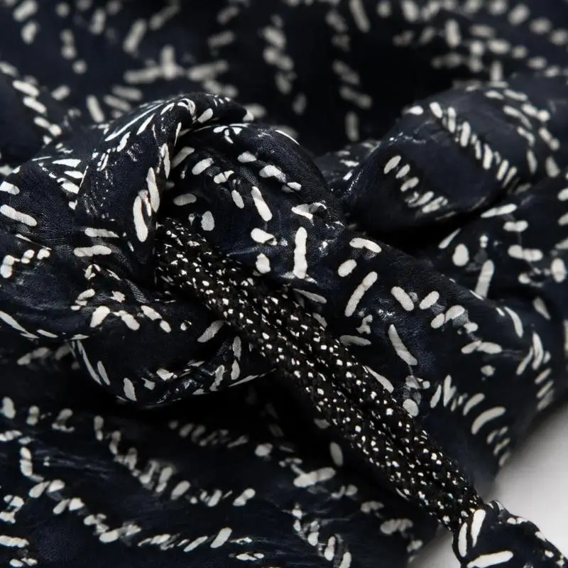 A52E Hardware-Free Tie Waist Scarf Belt with Multiple Tying Arrangements, Black Geometric Pattern, and Triangular Fabric