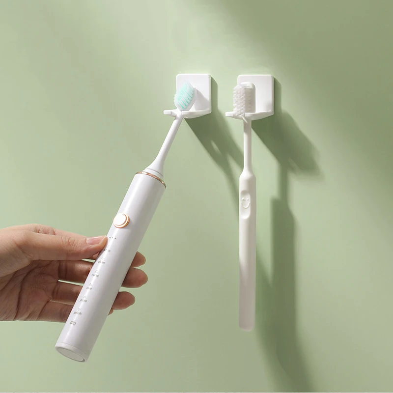 Estante de almacenamiento de cepillos de dientes para baño sin perforaciones, estante para cepillos de dientes eléctrico montado en la pared a prueba de polvo, 4 Uds.