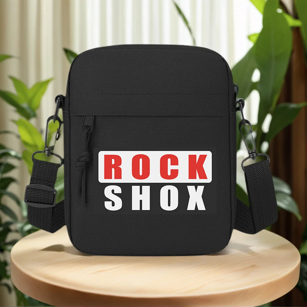 ROCK text above SHOX letters logo design Men Crossbody Bag Single Shoulder Women Cartoon Anime Film Printing Design Unisex