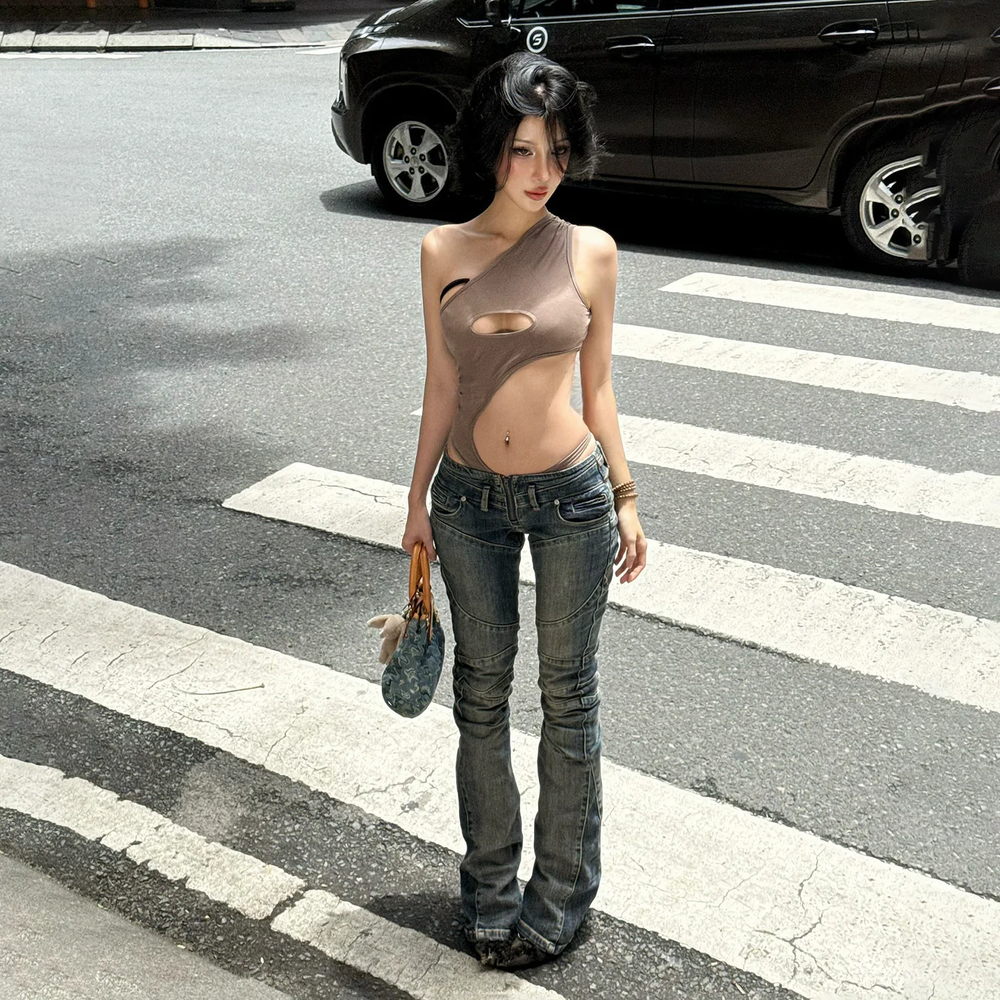 Vaqueros largos divididos de estilo retro de calle americana con un diseño sexy de pierna recta informal ajustado de tiro bajo