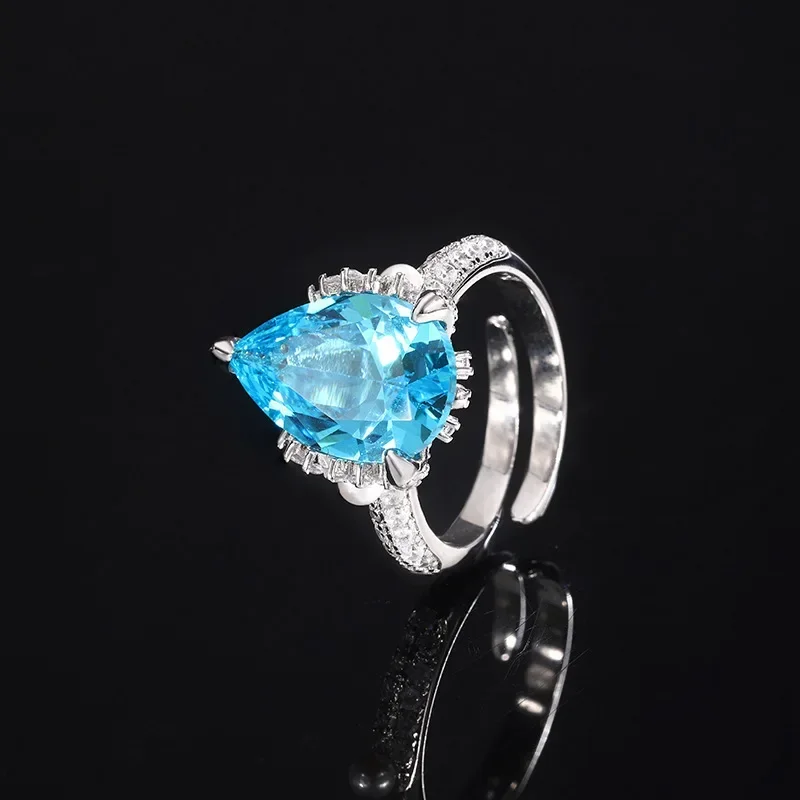 

Adjustable Ring with Radiant Green Blue Pear Shaped Gemstone Statement of Elegance Versatility Accessories for Women Jewelry