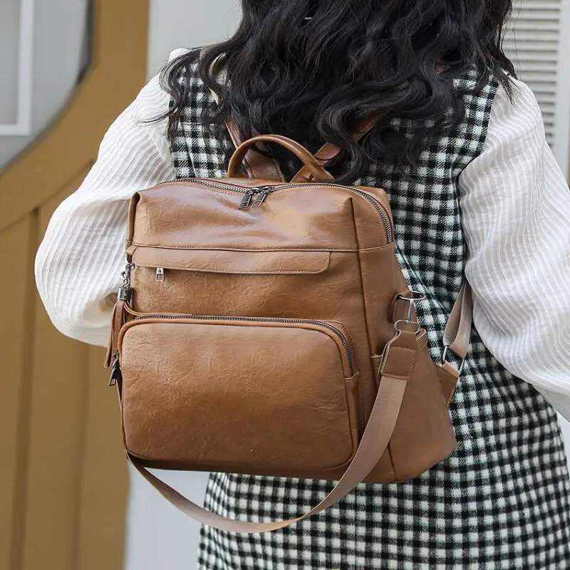 حقيبة ظهر جلدية جديدة بسحاب، عصرية مقاومة للماء، كتف متقاطع لطلاب المدارس المتوسطة والثانوية، حقيبة يد بكتف واحد