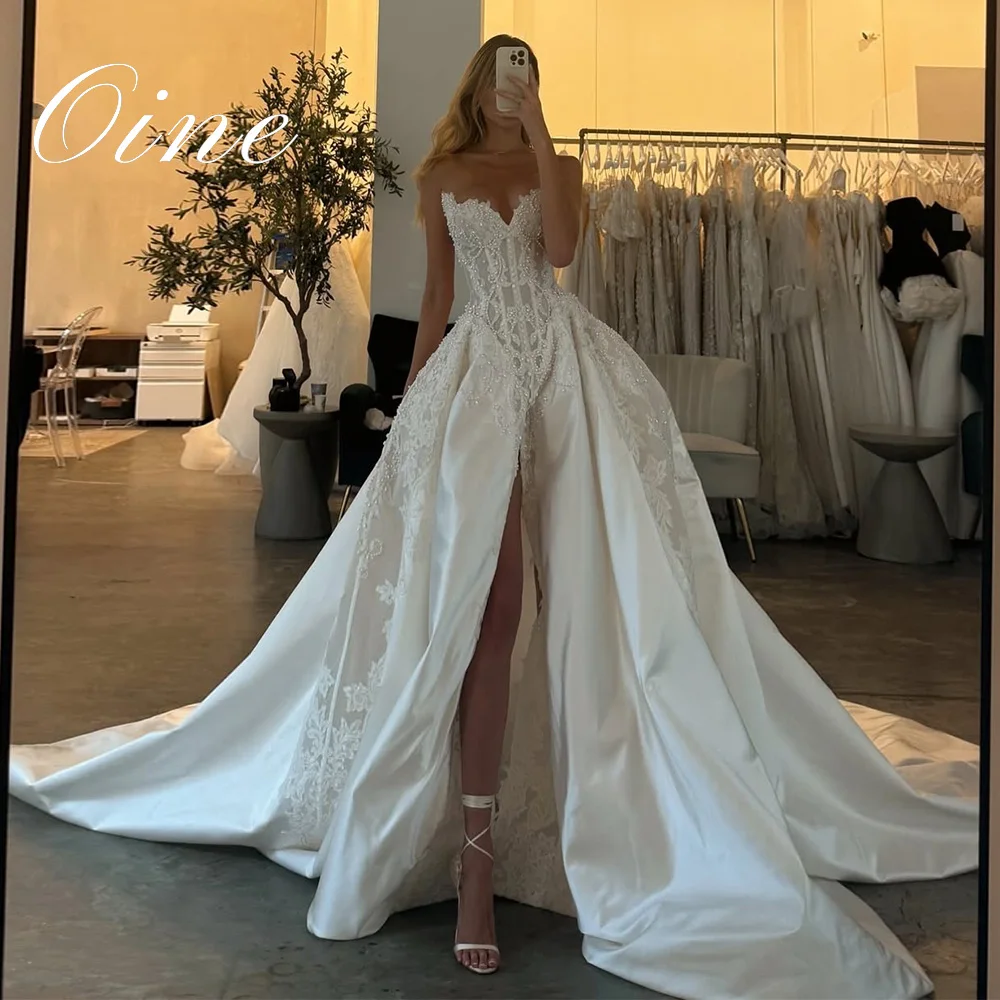 Oine Maßgeschneiderte Elegante Ärmellose Brautkleider 2026 Seitenschlitz A-Linie Perlen Brautkleider Plissee Spitzenapplikation Hochzeitskleider