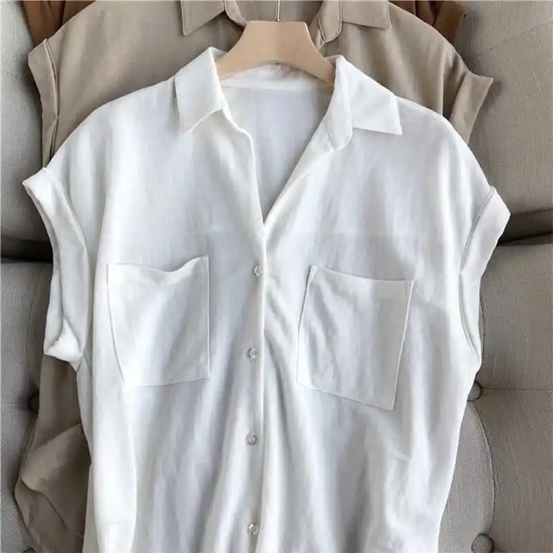 قميص بولو صيفي 2024 بتصميم فضفاض من قماش بيكيه بأكمام قصيرة وجيوب وأزرار على الطراز الفرنسي بطول عادي