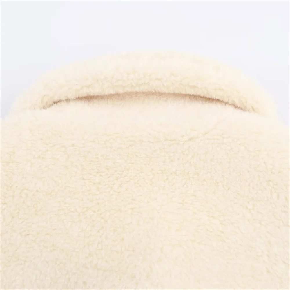 Herfst en winter nieuwe dameskledingstijl veelzijdige revers lange mouwen riem decoratie kunstbontjas