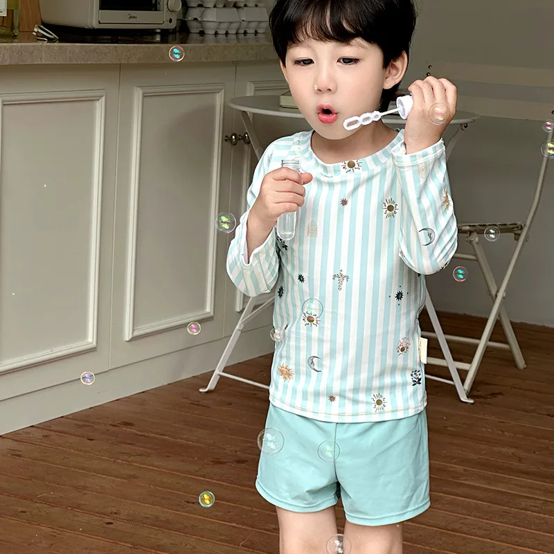 

2026 Summer New Children's Long Sleeved Sunscreen Split Simple Beach Vacation Quick Drying Swimsuit