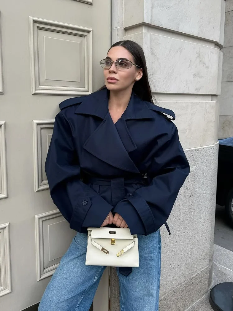 

Новая женская ветровка 2025 года: элегантное длинное пальто свободного кроя с пуговицами, однотонное, с поясом, для офиса и повседневной носки