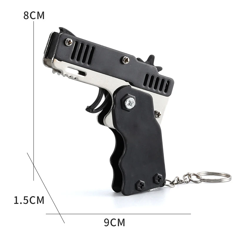 1pc Mini giocattolo pistola in metallo con elastico divertente pieghevole pistola chiave ciondolo ciondolo bambini regali di compleanno giocattoli ragazzo ragazza gioco bomboniere