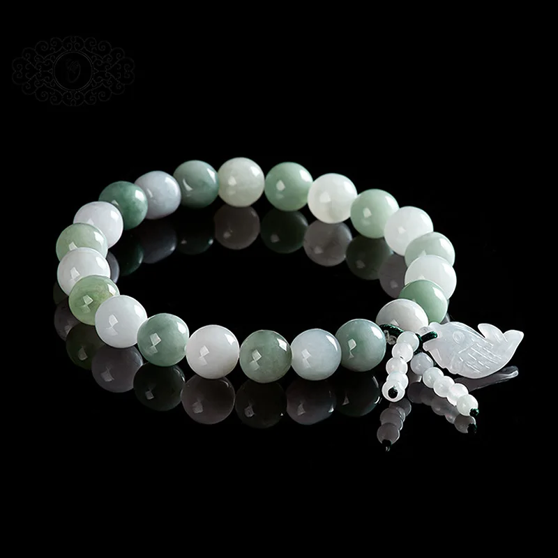 

Элегантный браслет из нефритовых бусин с подвеской в виде рыбки для плавания, символ струяния с простостью и процветанием
