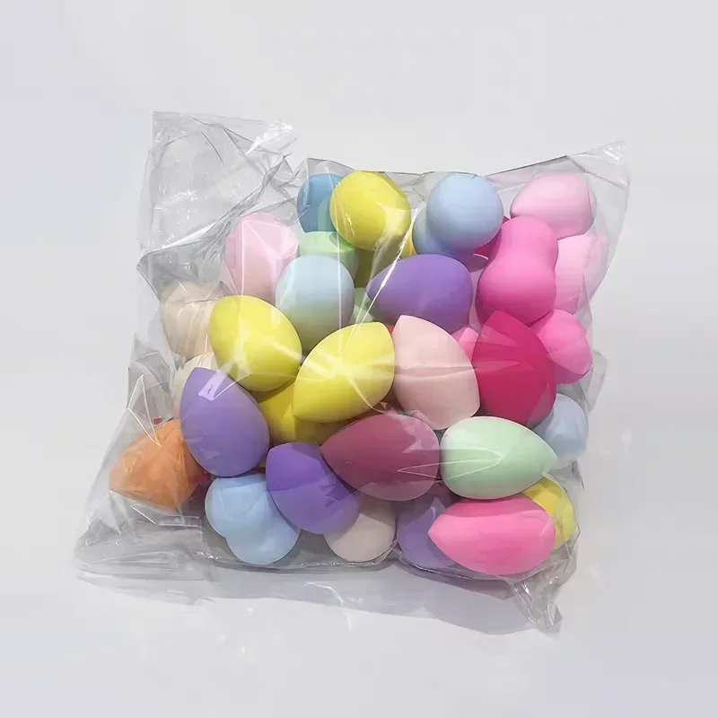 Mini bouffantes d'œufs cosmétiques, 50 pièces, mélange de poudre de fond de teint, mélangeur de maquillage, applicateur, éponge à usage sec et humide, outil de coussin d'air pour le visage