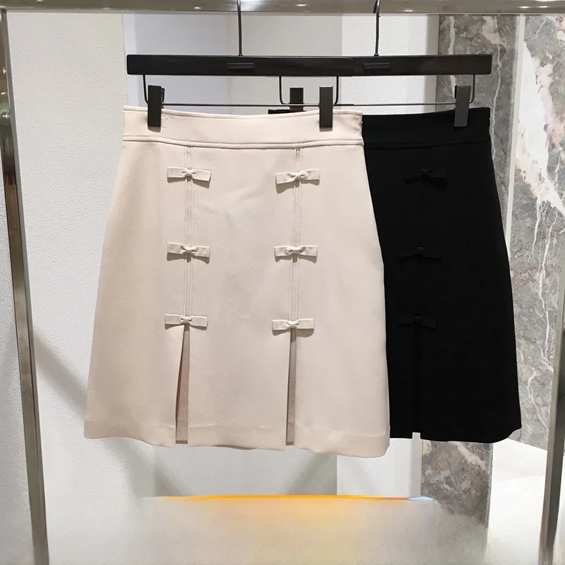 QPP Commuter Sle Koreaanse versie f-lengte rok met plooien, ritssluiting en midi-rok met knoop en middentaille