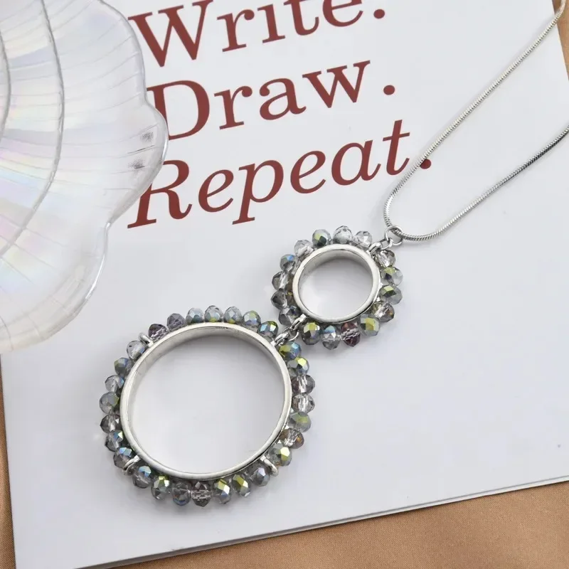 

A double-ring long necklace, a circle and diamond crystal sweater chain, a fashionable clothing necklace, a retro necklace