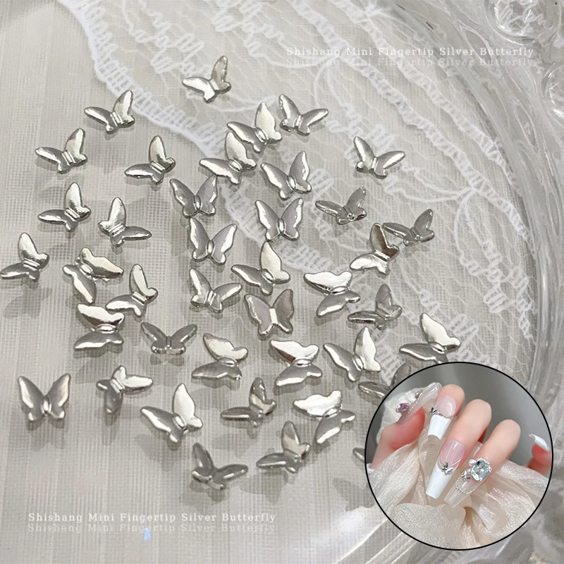 50pcs MINI ผีเสื้อเล็บอุปกรณ์เสริม Silver Alloy เพชรโลหะ 3D ปลายนิ้วผีเสื้อเล็กๆเพชร Charms ตกแต่ง