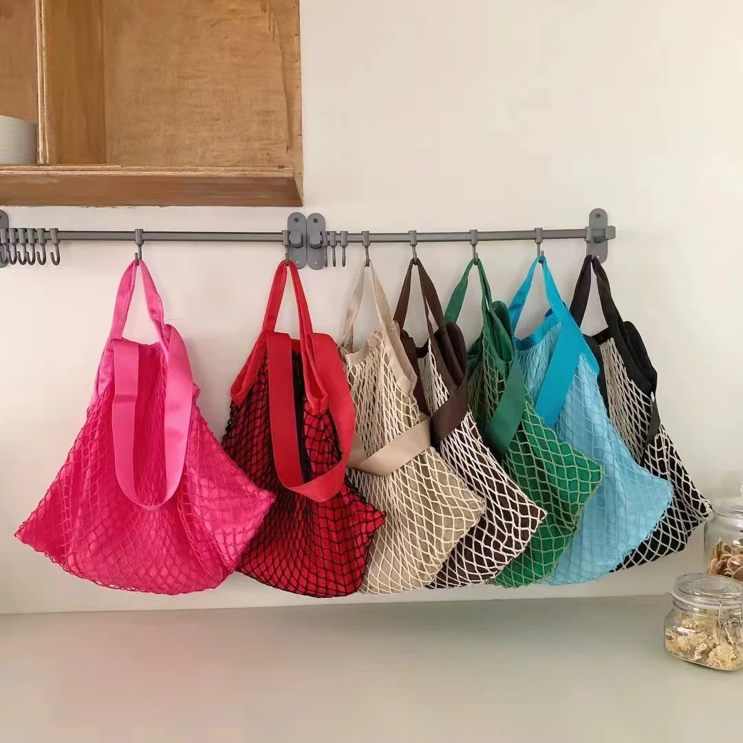 Bolso de malla informal para mujer, bolsa de mano de red de pesca, bolso de hombro tejido bohemio, bolso de mano femenino de Color caramelo, monederos de compras de frutas