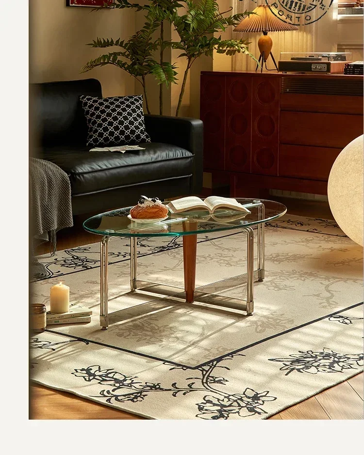 

A Nordic retro coffee table oval stainless tempered glass very simple and modern