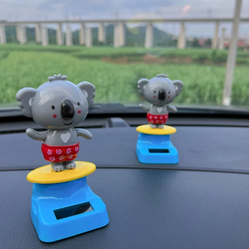 Popularidade quente de novos brinquedos solares dos desenhos animados bonito coala dança solar balançando cabeça brinquedo casa decoração do carro presente criativo