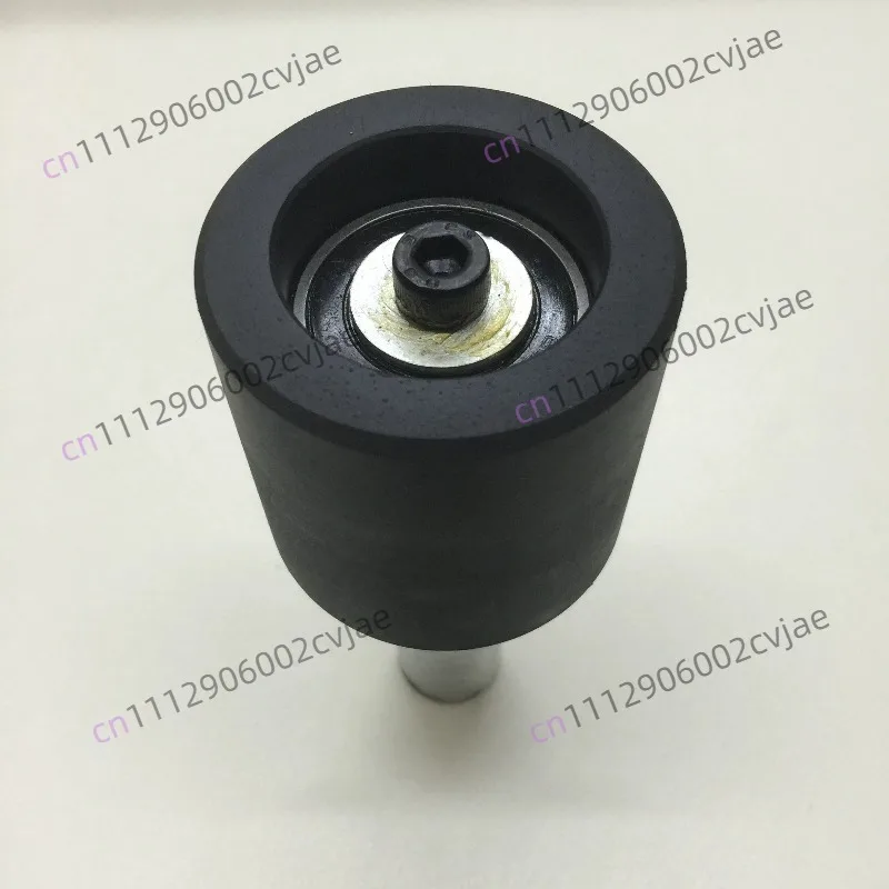 Tire disassembly and removal machine auxiliary arm manual tire roller
