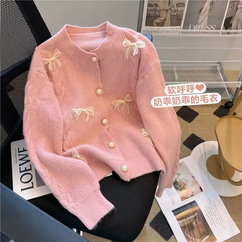 Sweet Wind Bow Knitted Jacket Women\'s Early Autumn High End Soft Glutinous Sweater Unique Korean Version Pearl Button Cardigan