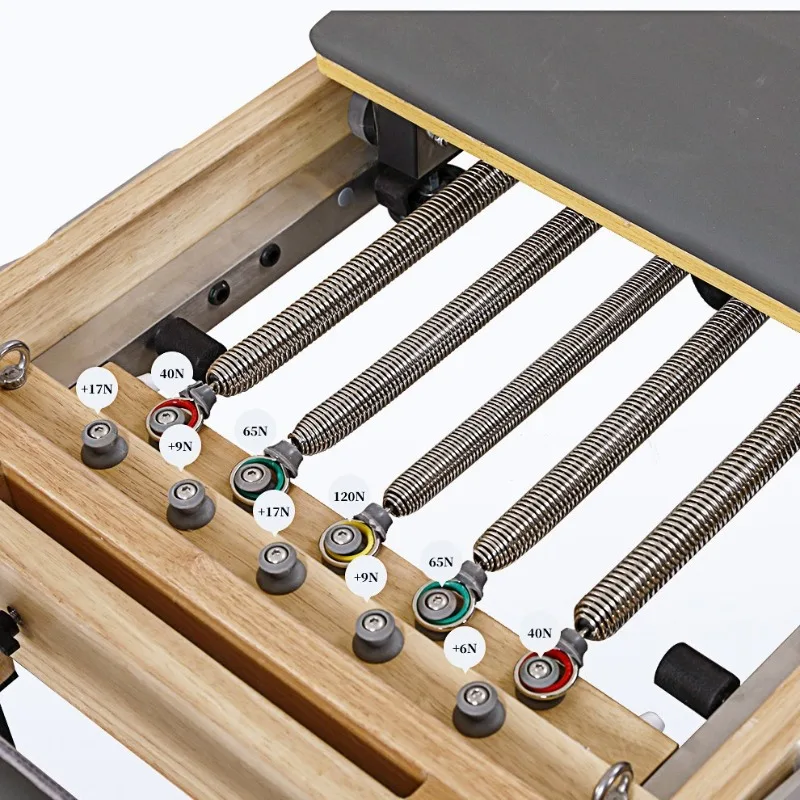 

Large equipment commercial household rubber wood pilates bed folding core bed