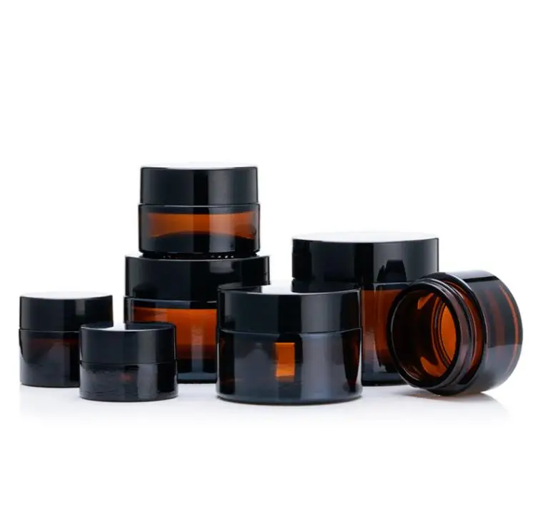 

200pcs 5g 10g 15g 20g 30g 50g Amber Glass Facial Cream Jar Cosmetic Packing Container Refillable Pot with Black Lid SN75