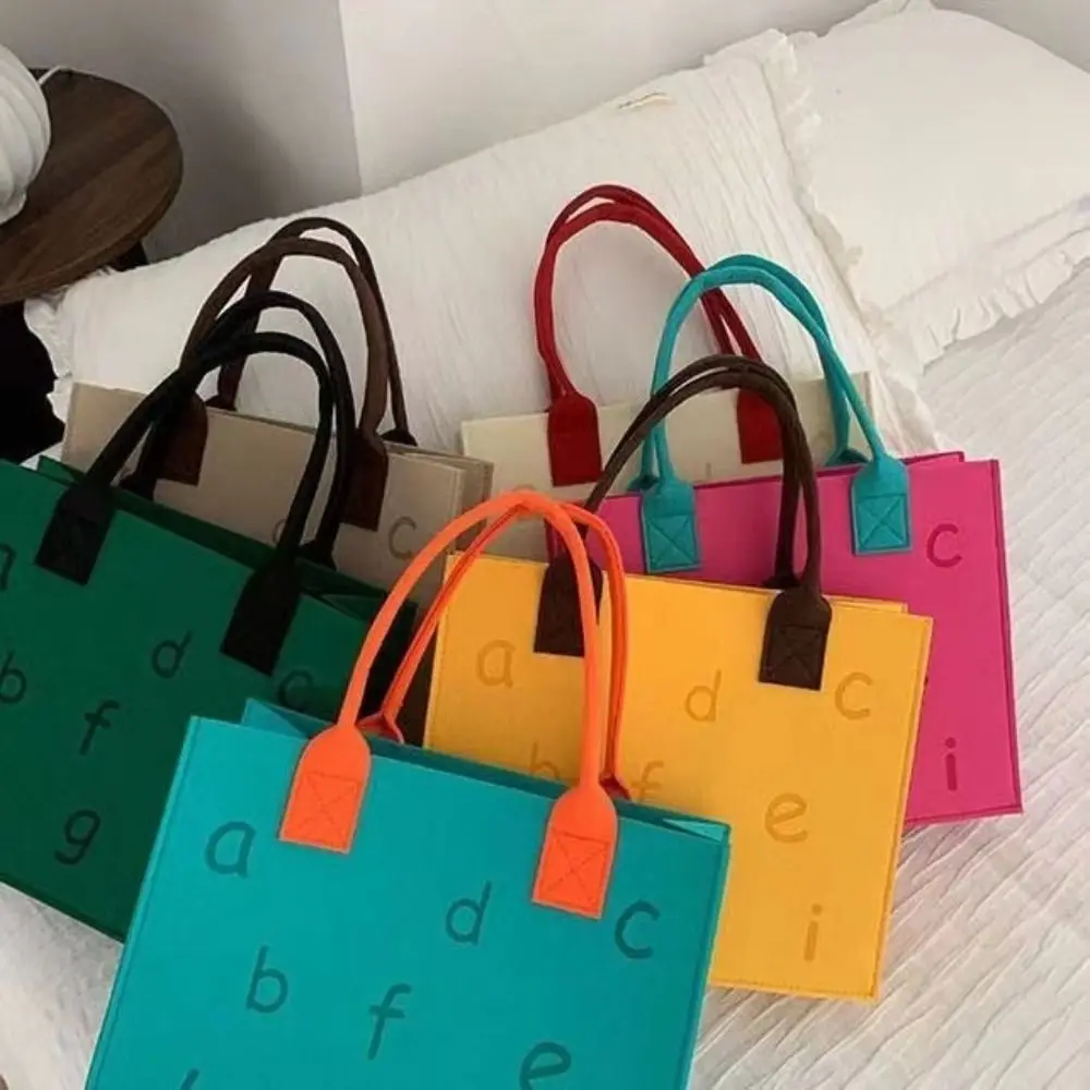 Bolso de mano de fieltro con letras simples, bolsa de almacenamiento de Color sólido, bolsa de mensajero de gran capacidad, bolsa de regalo para niños